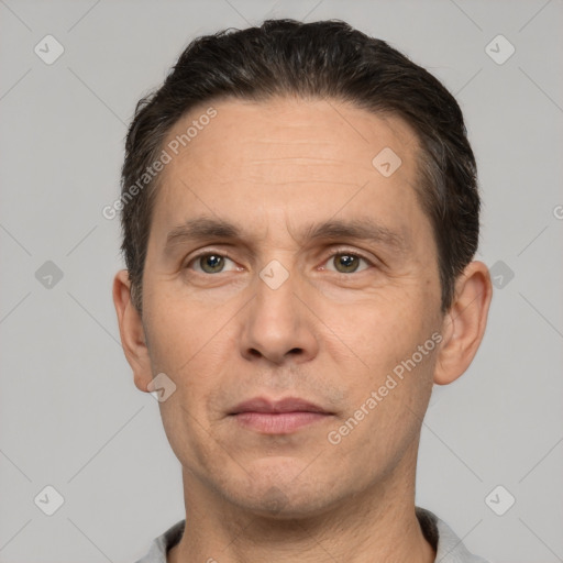 Neutral white adult male with short  brown hair and brown eyes