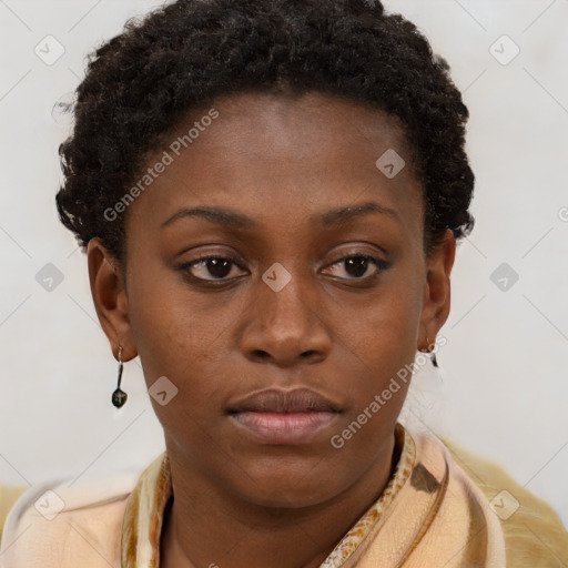 Neutral black young-adult female with short  brown hair and brown eyes