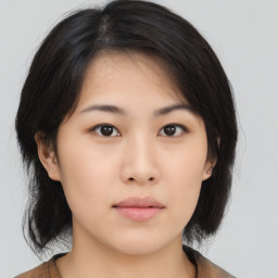 Neutral asian young-adult female with medium  black hair and brown eyes