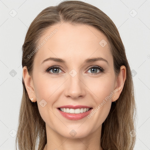 Joyful white young-adult female with long  brown hair and grey eyes