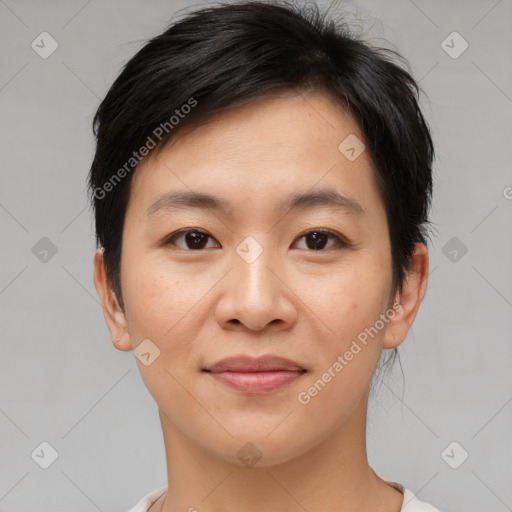 Joyful asian young-adult female with short  brown hair and brown eyes