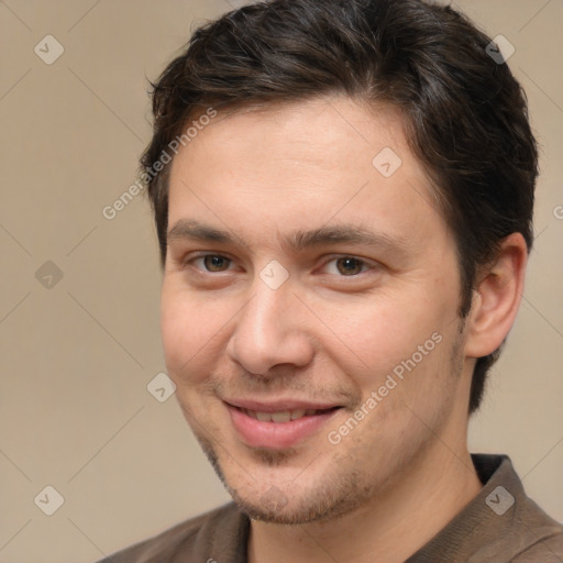 Joyful white young-adult male with short  brown hair and brown eyes