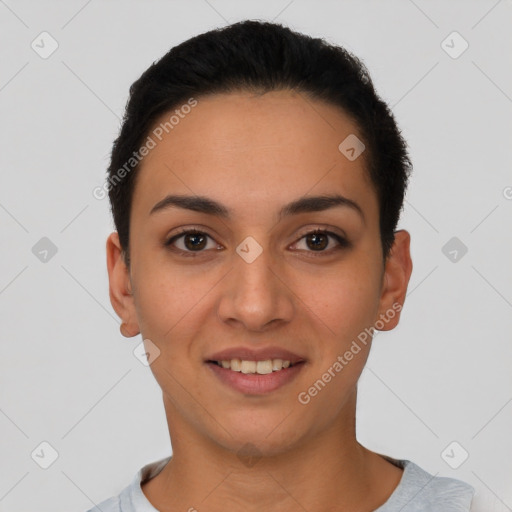 Joyful latino young-adult female with short  brown hair and brown eyes