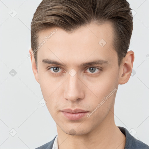 Neutral white young-adult male with short  brown hair and brown eyes