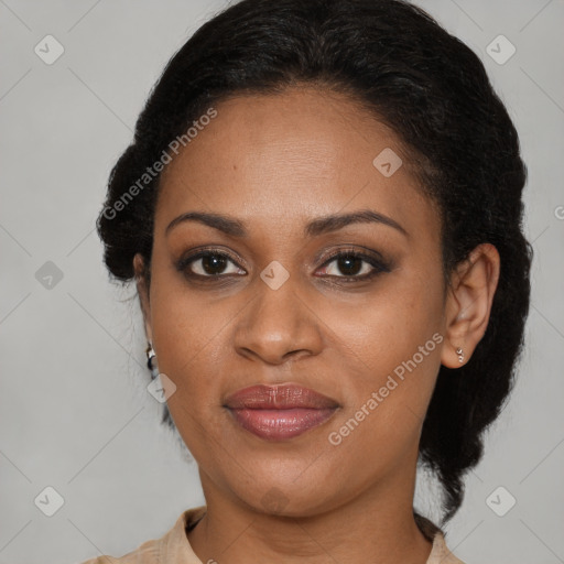 Joyful black adult female with short  brown hair and brown eyes