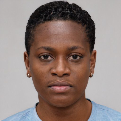 Neutral black young-adult female with short  brown hair and brown eyes