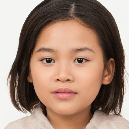 Neutral asian child female with medium  brown hair and brown eyes