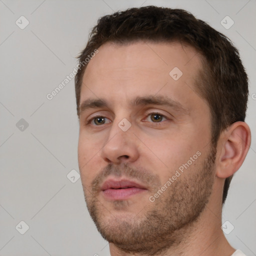 Neutral white young-adult male with short  brown hair and brown eyes