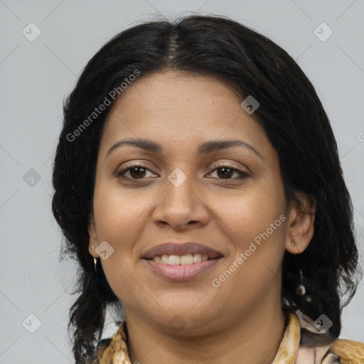 Joyful latino young-adult female with medium  brown hair and brown eyes