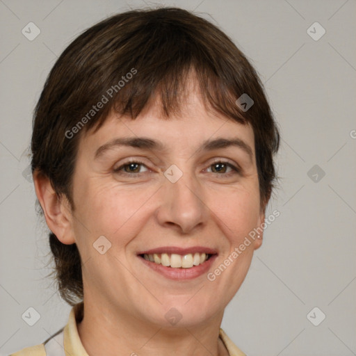 Joyful white adult female with medium  brown hair and brown eyes