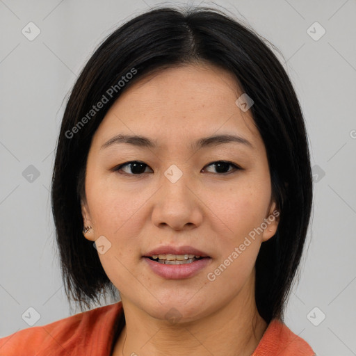 Joyful asian young-adult female with medium  black hair and brown eyes