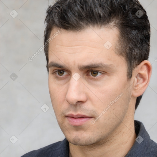 Neutral white adult male with short  black hair and brown eyes