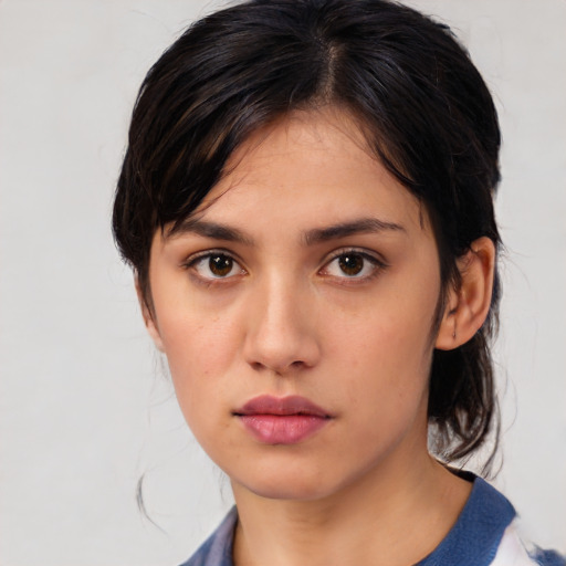 Neutral white young-adult female with medium  black hair and brown eyes