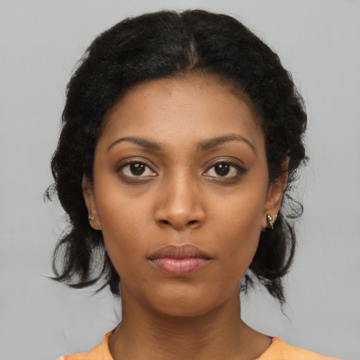 Neutral black young-adult female with medium  black hair and brown eyes