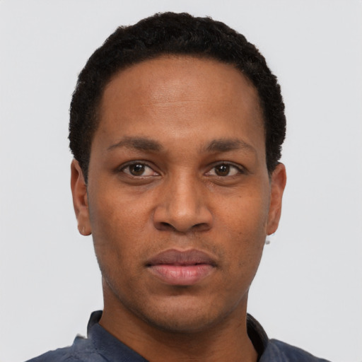 Neutral black young-adult male with short  black hair and brown eyes