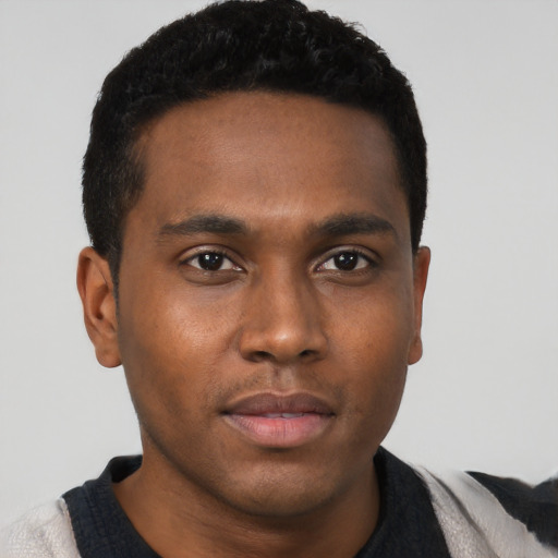 Neutral black young-adult male with short  black hair and brown eyes