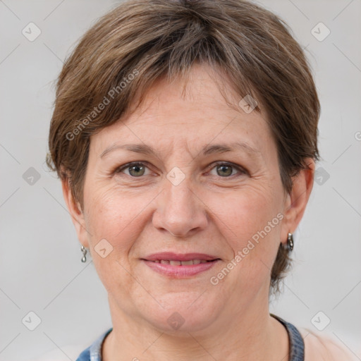 Joyful white adult female with medium  brown hair and grey eyes