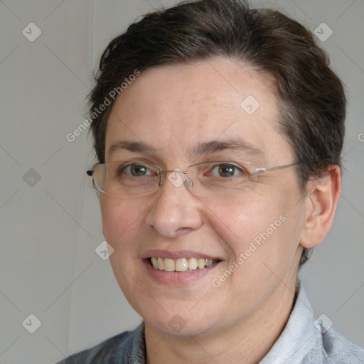 Joyful white adult female with short  brown hair and grey eyes