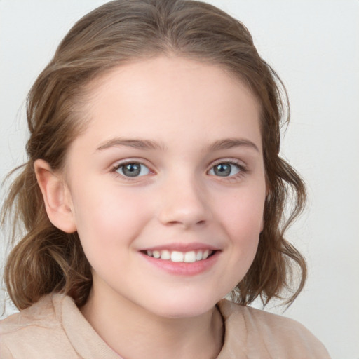 Joyful white child female with medium  brown hair and grey eyes