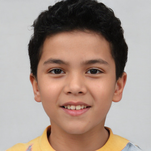 Joyful asian child male with short  brown hair and brown eyes