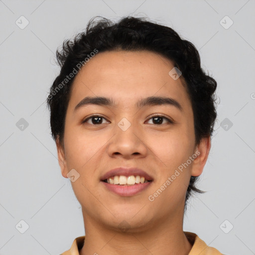 Joyful latino young-adult female with short  black hair and brown eyes