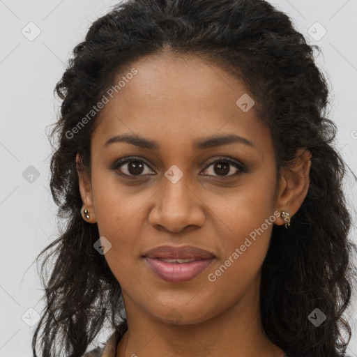 Joyful black young-adult female with long  brown hair and brown eyes