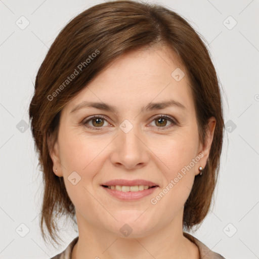 Joyful white young-adult female with medium  brown hair and grey eyes