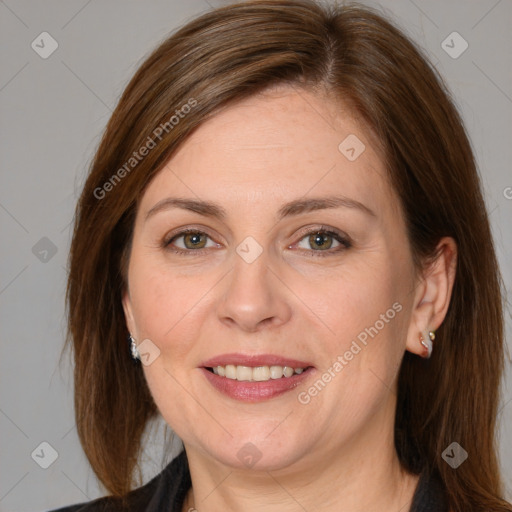 Joyful white adult female with medium  brown hair and grey eyes