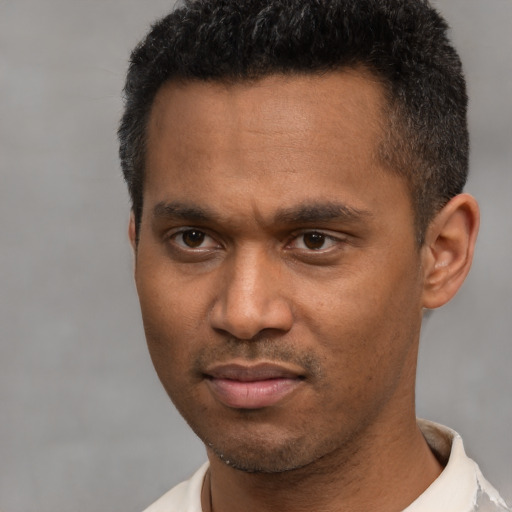 Neutral latino young-adult male with short  brown hair and brown eyes