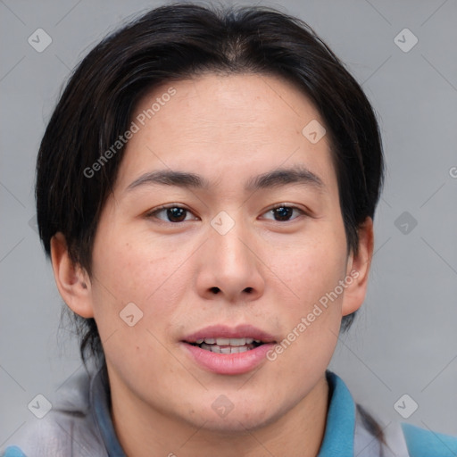 Joyful asian young-adult male with medium  brown hair and brown eyes