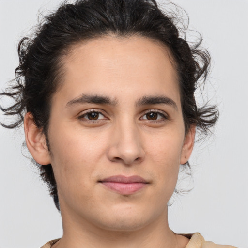 Joyful white young-adult male with medium  brown hair and brown eyes