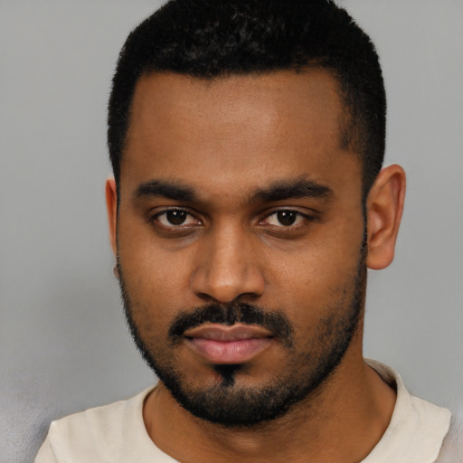 Neutral black young-adult male with short  black hair and brown eyes