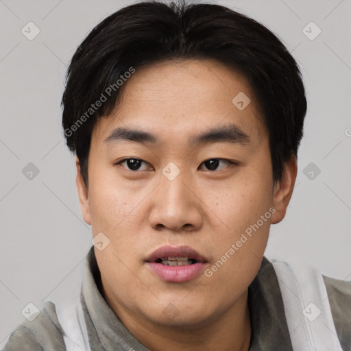 Neutral asian young-adult male with short  black hair and brown eyes