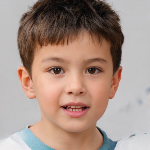 Joyful white child male with short  brown hair and brown eyes