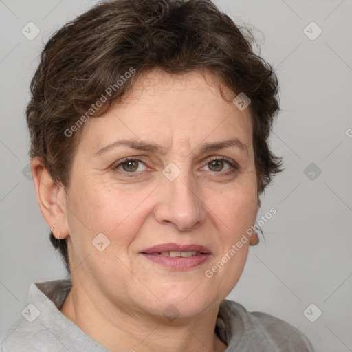 Joyful white adult female with short  brown hair and brown eyes