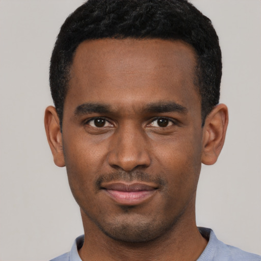 Neutral black young-adult male with short  brown hair and brown eyes