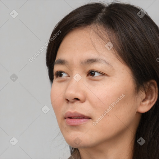 Neutral white young-adult female with medium  brown hair and brown eyes