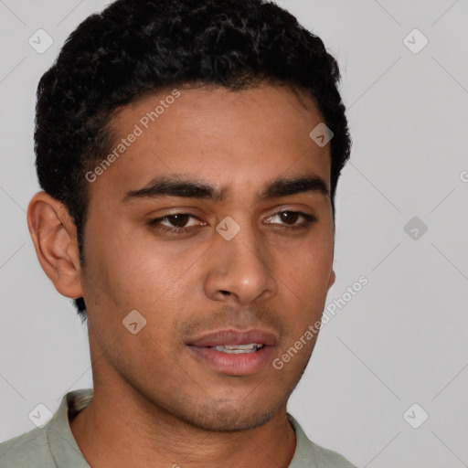 Neutral latino young-adult male with short  brown hair and brown eyes