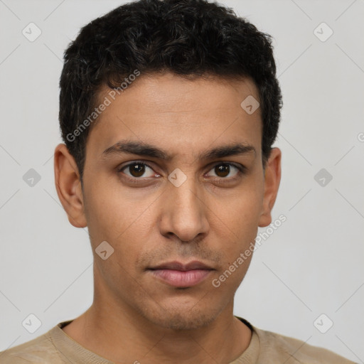 Neutral white young-adult male with short  black hair and brown eyes