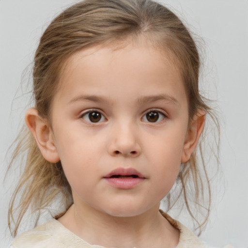 Neutral white child female with medium  brown hair and brown eyes