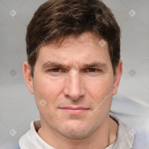 Neutral white adult male with short  brown hair and grey eyes