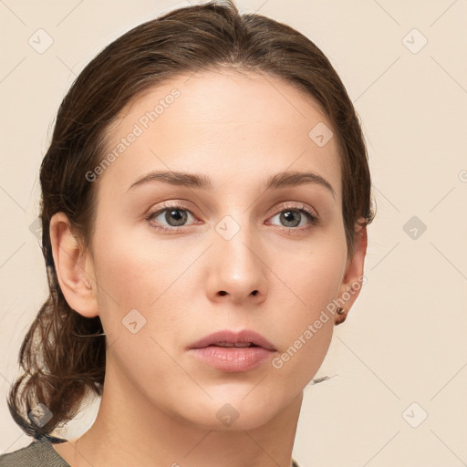 Neutral white young-adult female with medium  brown hair and grey eyes