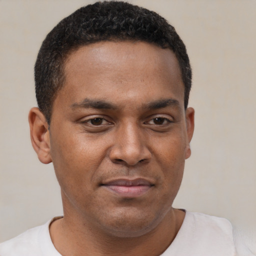 Neutral latino young-adult male with short  brown hair and brown eyes