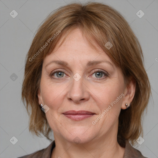 Joyful white adult female with medium  brown hair and grey eyes