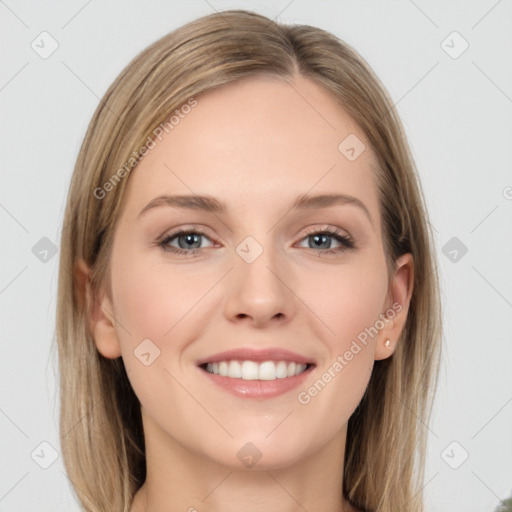 Joyful white young-adult female with long  brown hair and grey eyes