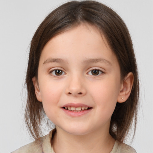 Joyful white child female with medium  brown hair and brown eyes