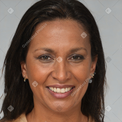 Joyful black adult female with medium  brown hair and brown eyes