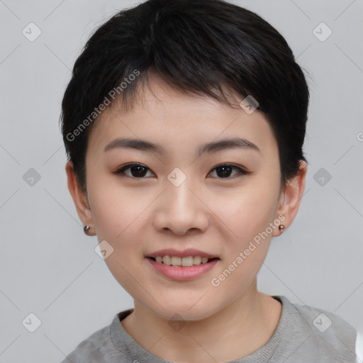 Joyful asian young-adult female with short  black hair and brown eyes