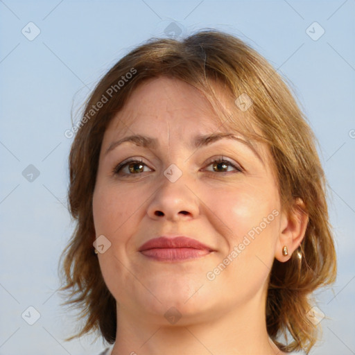 Joyful white adult female with medium  brown hair and brown eyes