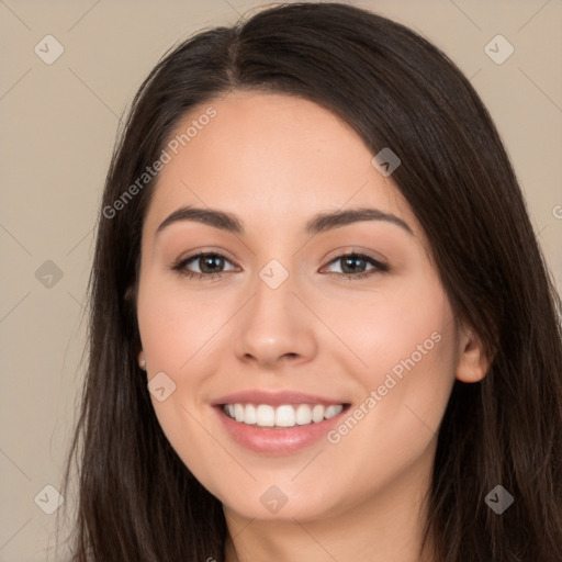 Joyful white young-adult female with long  brown hair and brown eyes